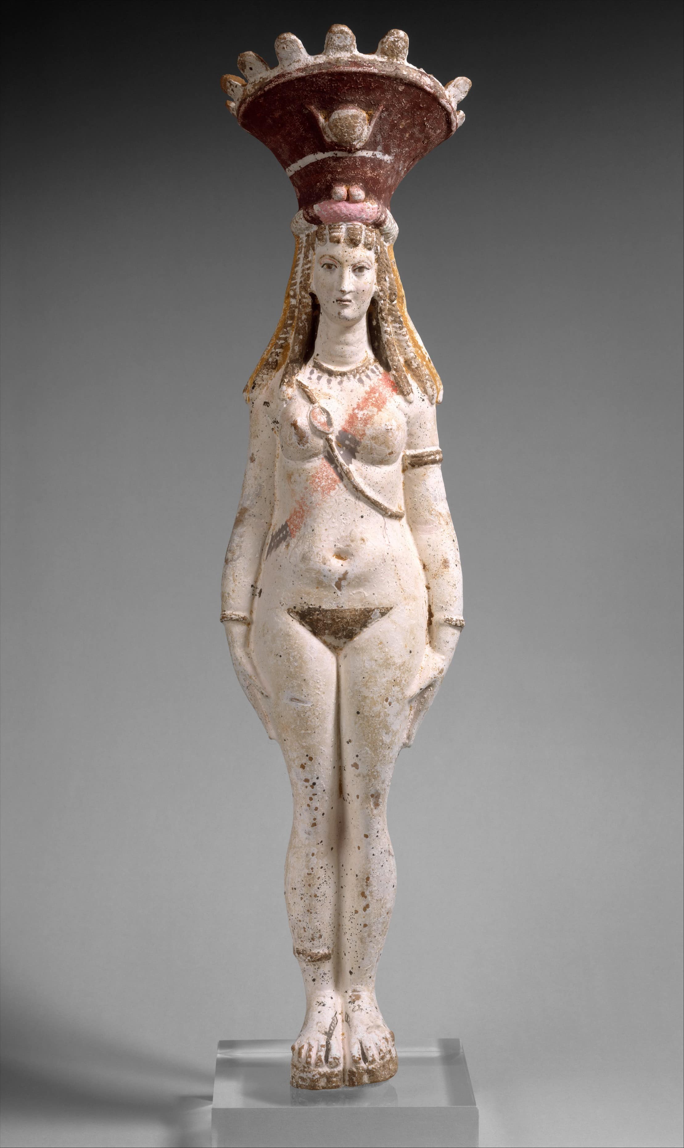 Figure d’Isis-Aphrodite en terre cuite peinte en marron, noir, rouge et rose sur engobe blanc,. Découverte en Égypte et datée de la période romaine, deuxième siècle de notre ère © MET Museum